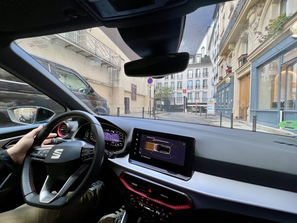 driving in paris france as seen from passenger seat of a car