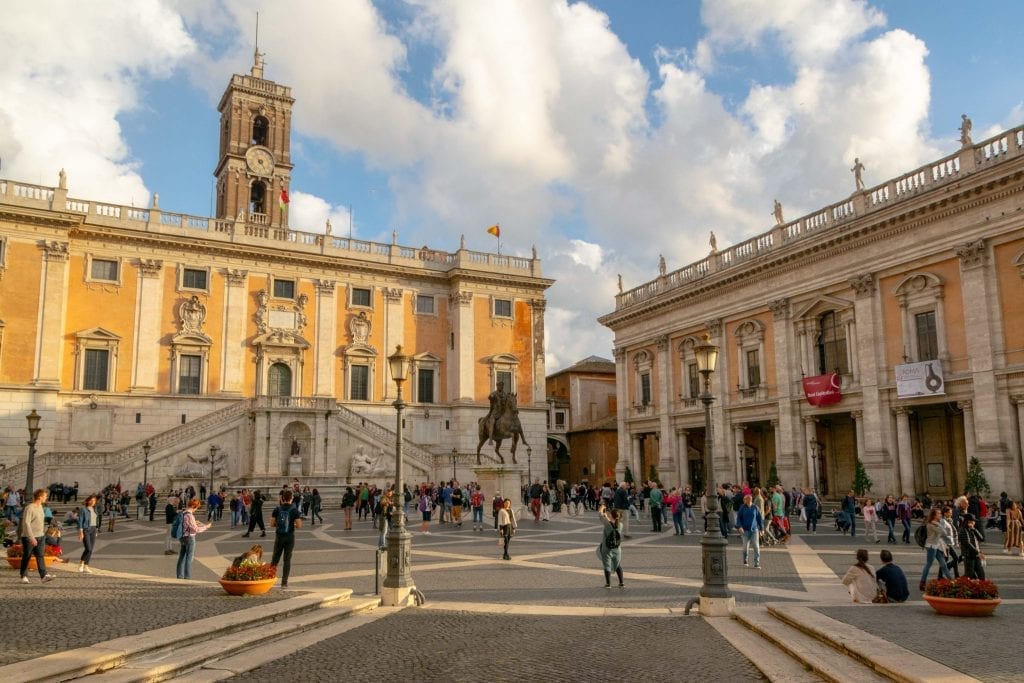 oval Piazza Campidoglio with yellow building, one of the best piazzas to see on a 4 day rome itinerary