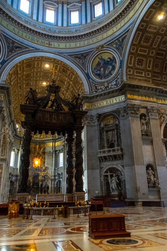 Interior of St. Peter's Basilica with altar in the image