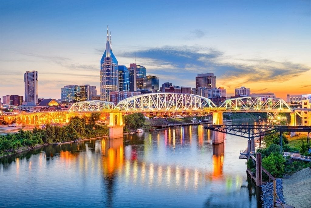 Skyline of Nashville Tennessee at sunset overlooking the river, one of the most romantic getaways in the United States
