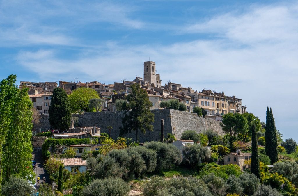 Photo of Saint-Paul-de-Vence France taken from outside the city. You can see the city walls.