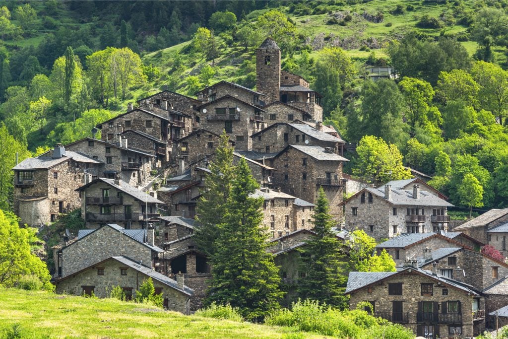 stone village in the hills of andorra, visible on a france road trip itinerary from toulouse to andorra