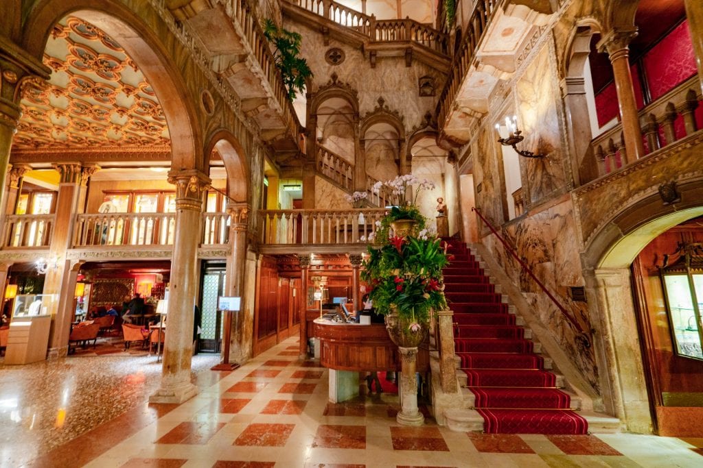Lobby and staircase of Hotel Danieli in Venice--the perfect luxury hotel when deciding where to stay in Venice!